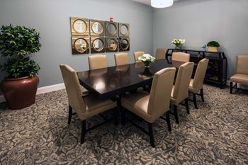 a dining room with a table and chairs at Arbor Hills, Lakeland
